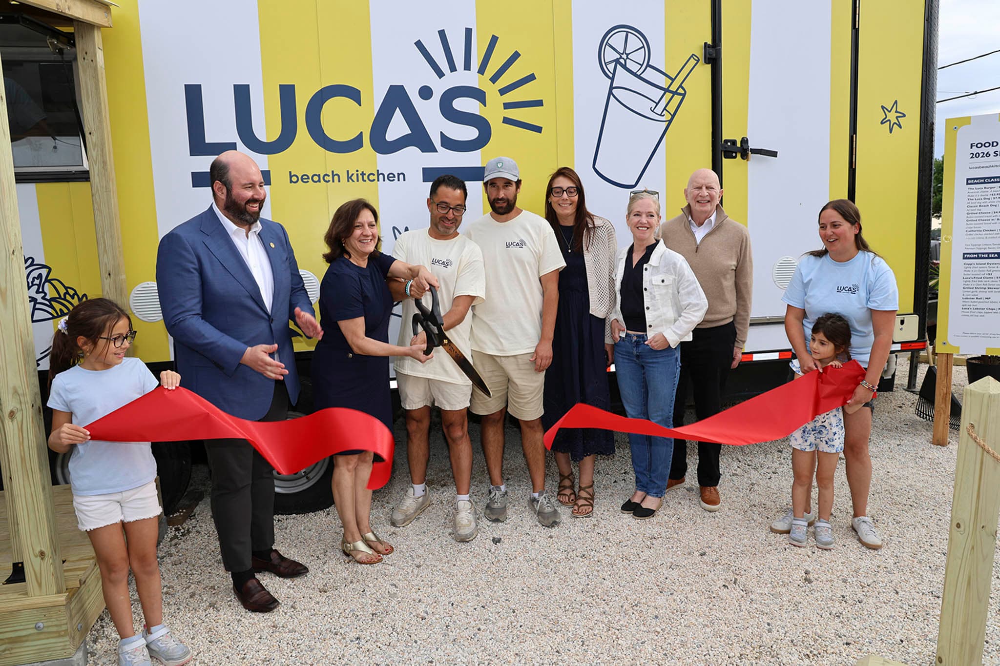 Ribbon cutting at the Luca's Beach Kitchen grand opening